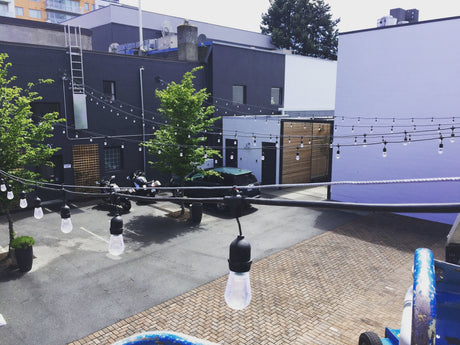 Hanging G30 Bulbs in a public courtyard